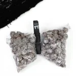 snack bags filled with chocolate cereal with a clothespin to look like a bat