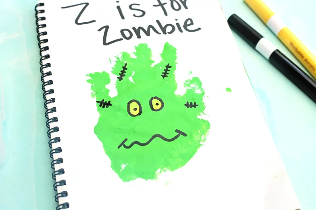 a green handprint decorated to look like a zombie