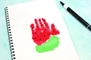 Spiral notebook with a handprint red watermelon