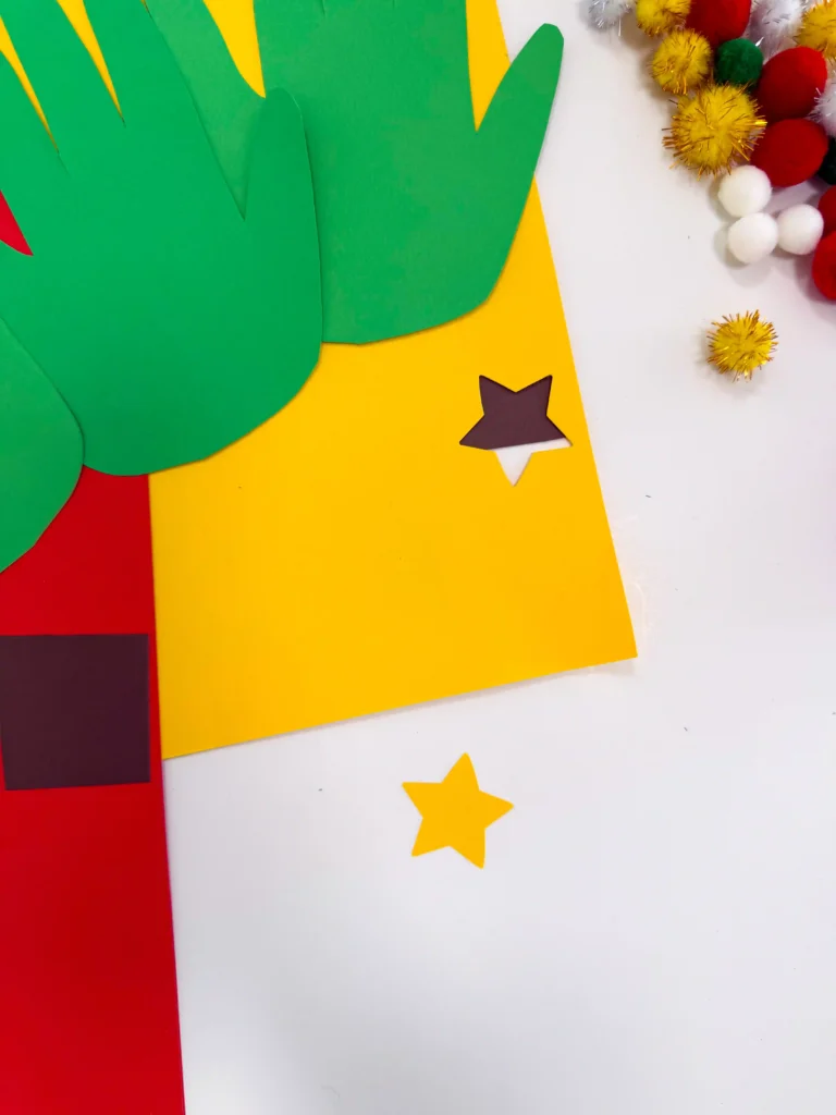 a star cut out of yellow construction paper