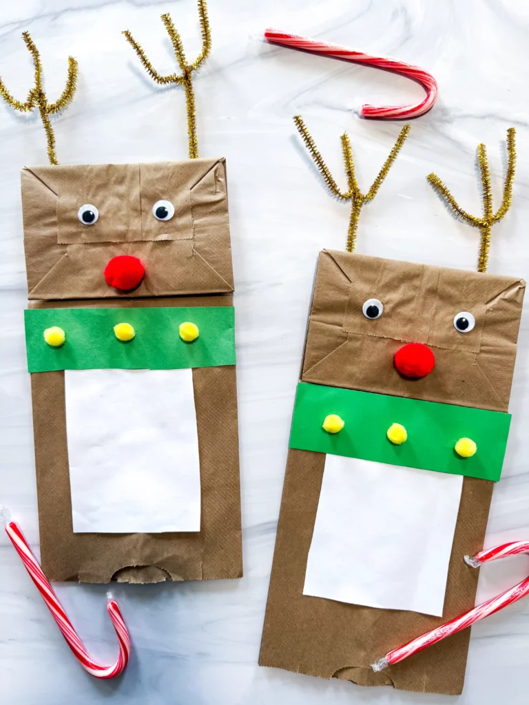 a brown paper bag decorated to look like a reindeer