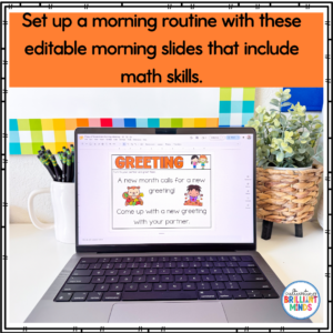 Laptop on a desk displaying editable morning slides titled 'GREETING' for a math-themed morning routine, with pencils and plants nearby.