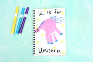 a Letter U Handprint Craft of a unicorn that reads "U is for unicorn"