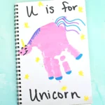 a Letter U Handprint Craft of a unicorn that reads "U is for unicorn"