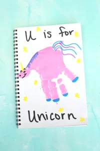 a Letter U Handprint Craft of a unicorn that reads "U is for unicorn"