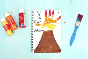 a Letter V Handprint Craft of a volcano and the handprint is the lava