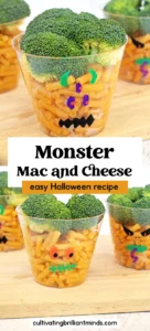 Clear cup filled with macaroni and broccoli, decorated with colorful faces to look like a Halloween monster cheese cup.