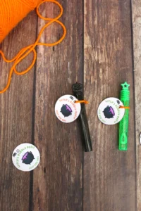 bubble wands with a tag that reads "witch's bubbly brew just for you"