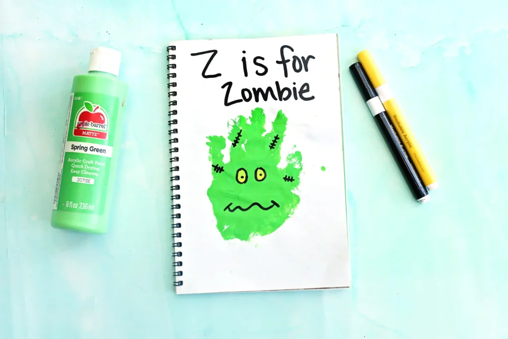 a green handprint decorated to look like a zombie