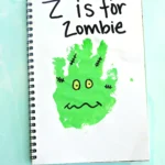 a green handprint decorated to look like a zombie