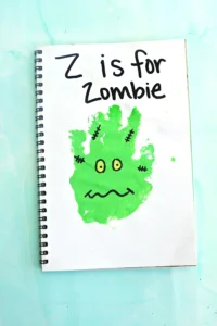 a green handprint decorated to look like a zombie