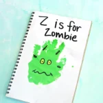 a green handprint decorated to look like a zombie