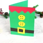 a diy christmas card that looks like an elf outfit