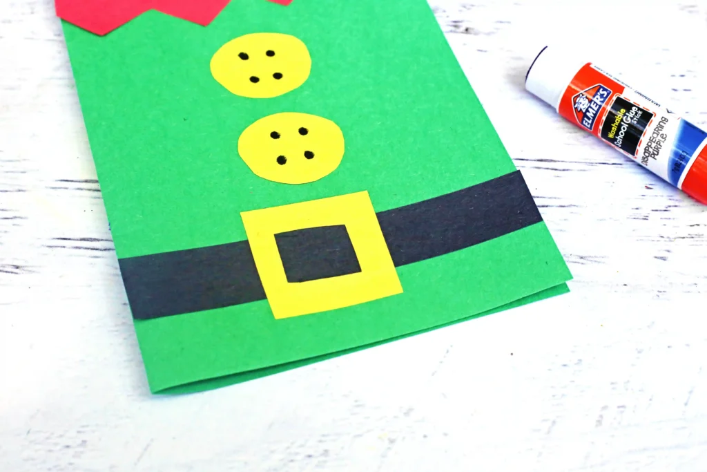 a diy christmas card that looks like an elf outfit