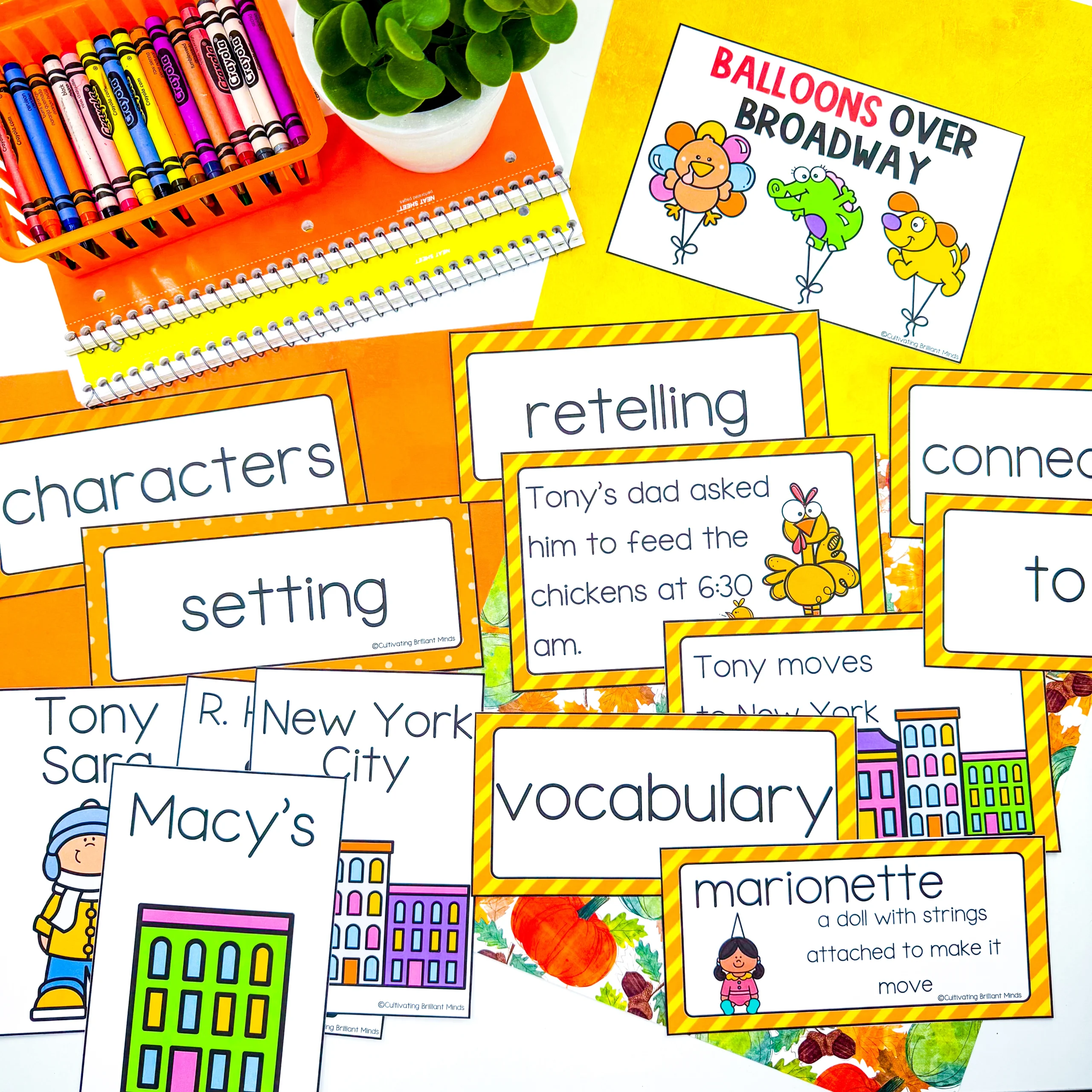 Colorful classroom vocabulary cards spread over a yellow background, showing words like characters, retelling, and vocabulary with cartoon figures.