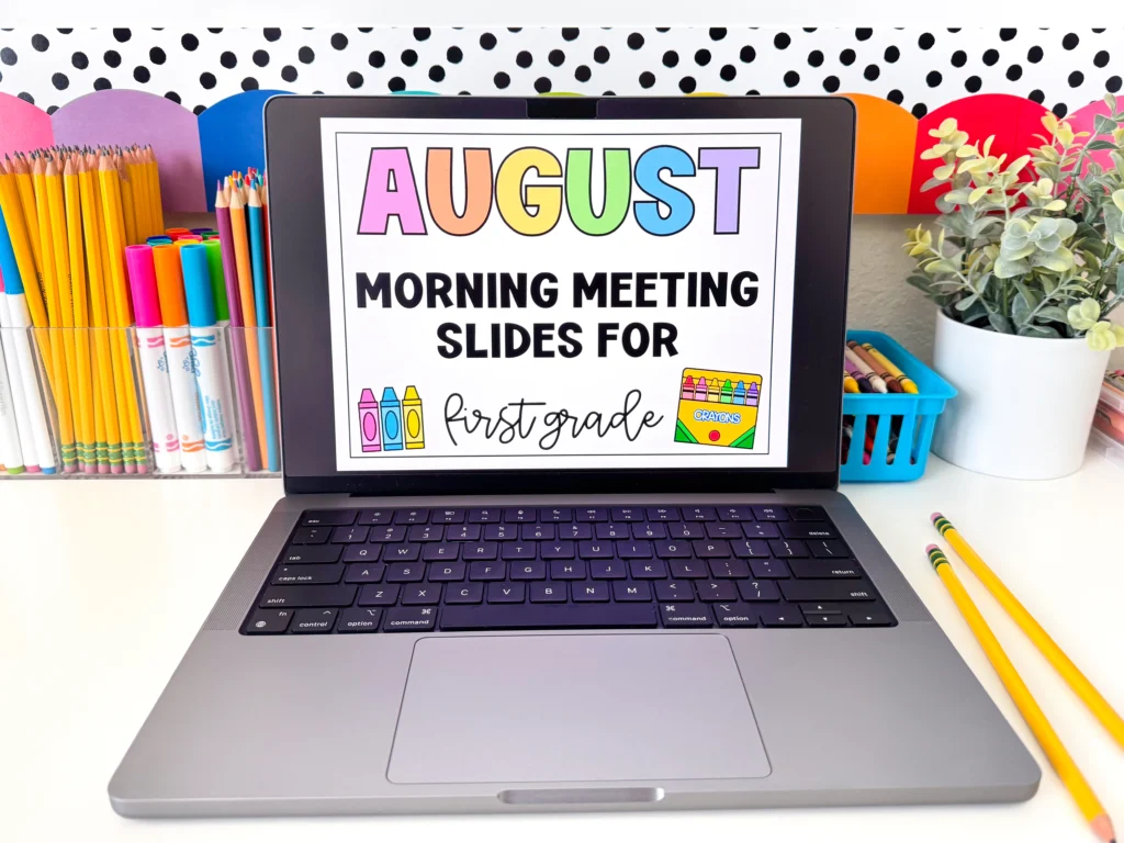 a computer with a slide that says august morning meeting slides for first grade
