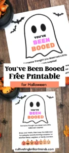 Halloween-themed flyer with a ghost outline and the phrase 'YOU'VE BEEN BOOED' in colorful letters, surrounded by pumpkins and bats on a wooden surface.